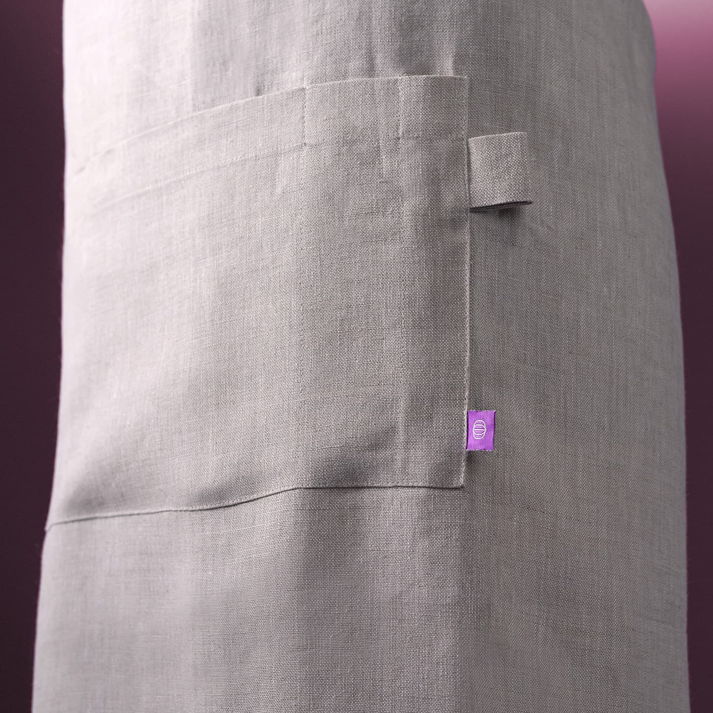 Apron detail shot: natural color, tines tag
