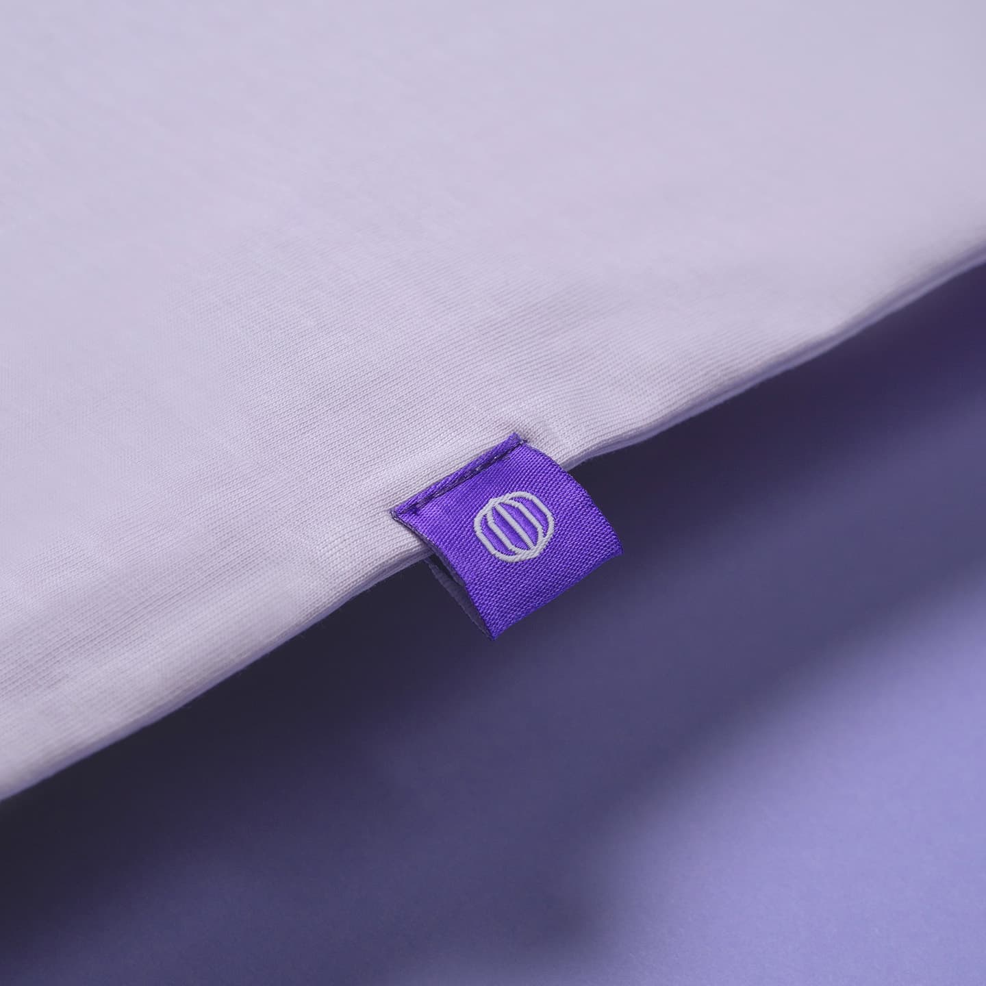 Close-up photo of the Tines tag on the side of the Buds T-shirt