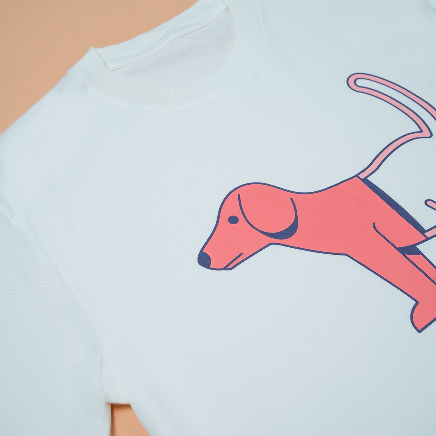 Close-up photo of the design of the Woof T-shirt
